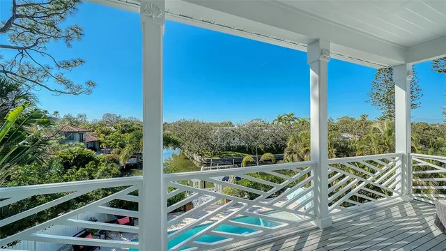 a view of a hallway with a chandelier