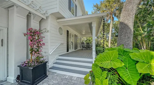 a living room with furniture or outdoor view and a large window