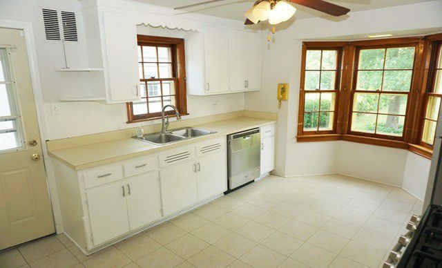 324 South Maple Street Itasca, IL 60143 - Photo 16 of 21 a kitchen with a sink and cabinets