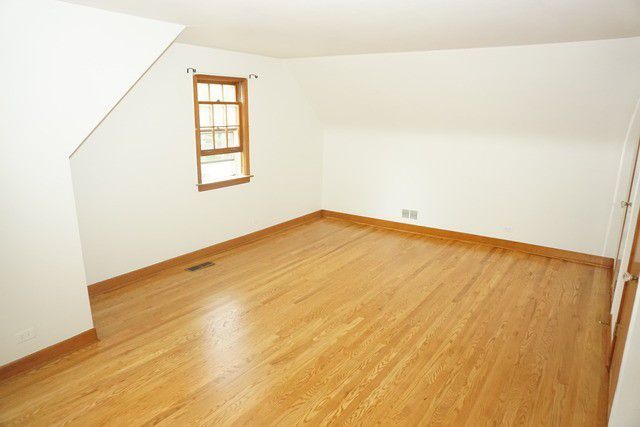 324 South Maple Street Itasca, IL 60143 - Photo 18 of 21 an empty room with windows