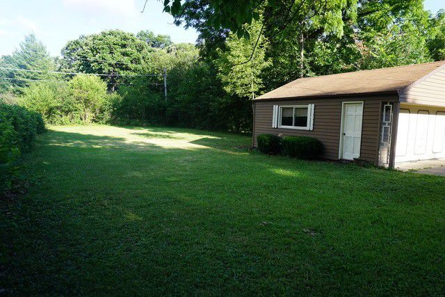 324 South Maple Street Itasca, IL 60143 - Photo 6 of 21 a view of a house with a backyard