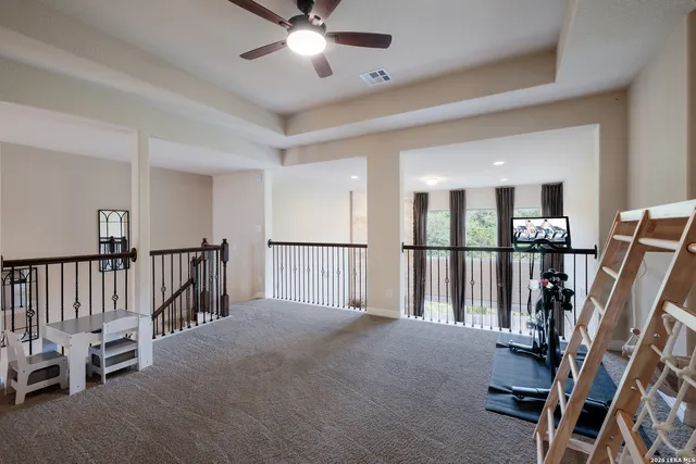 a view of a hallway with workspace