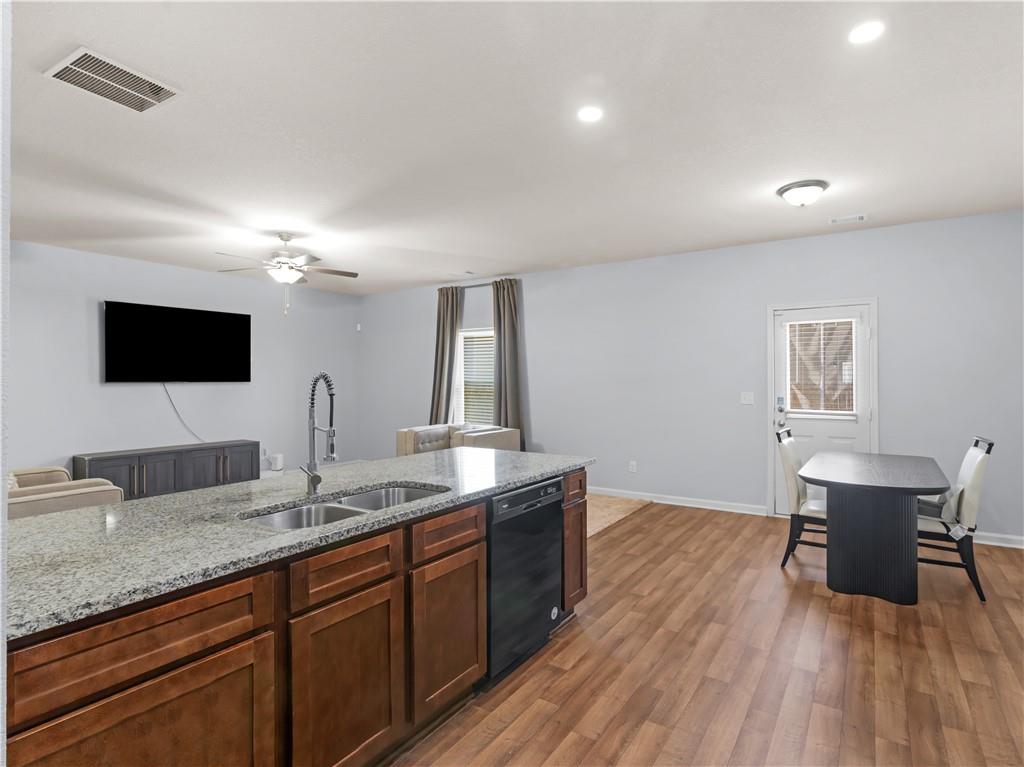 10891 Wheeler Trace Hampton, GA 30228 - Photo 20 of 45 a spacious bathroom with a granite countertop double vanity sink and a mirror