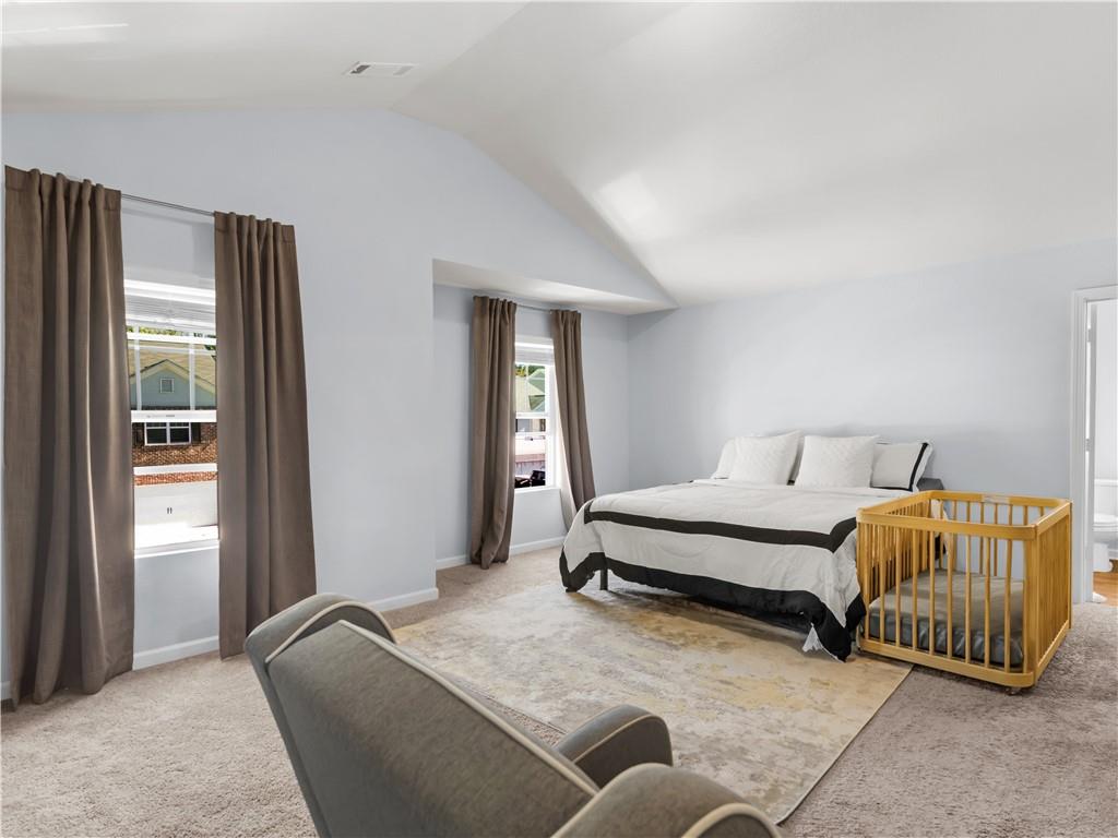 10891 Wheeler Trace Hampton, GA 30228 - Photo 21 of 45 a bedroom with bed and a window