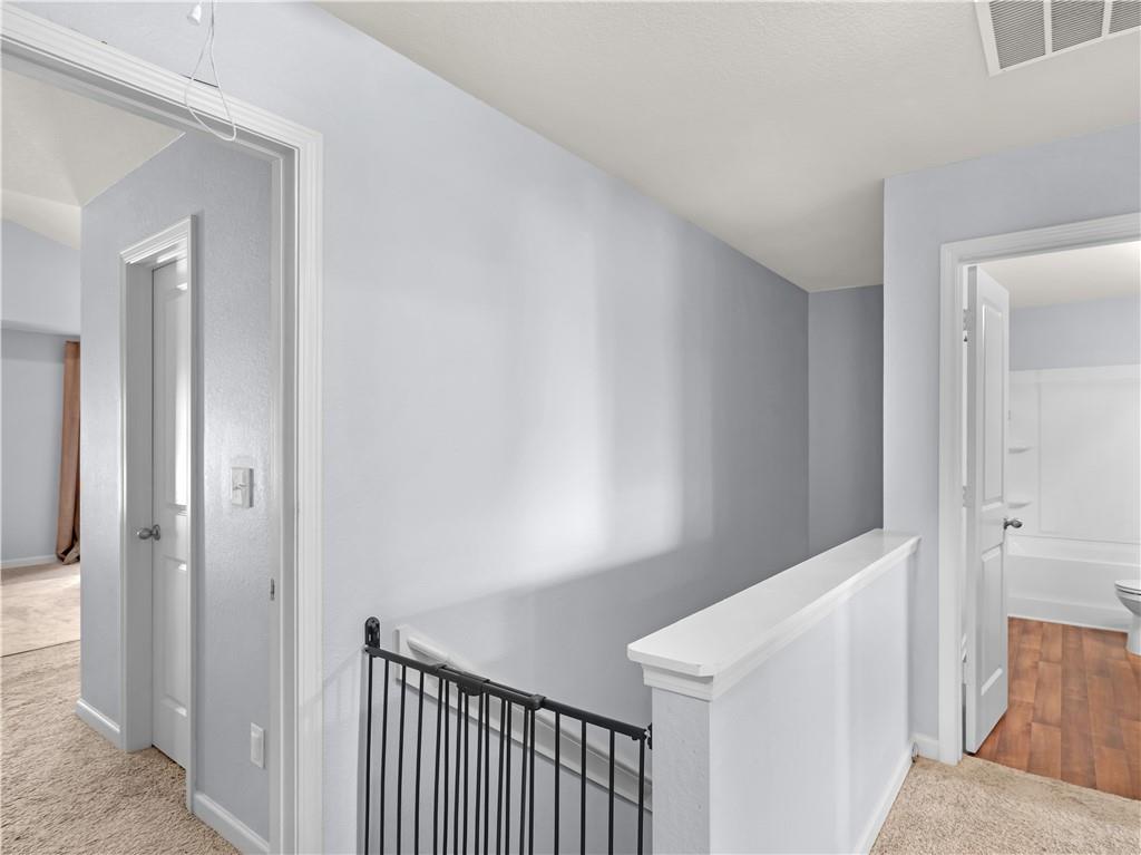 10891 Wheeler Trace Hampton, GA 30228 - Photo 29 of 45 a view of a hallway with closet