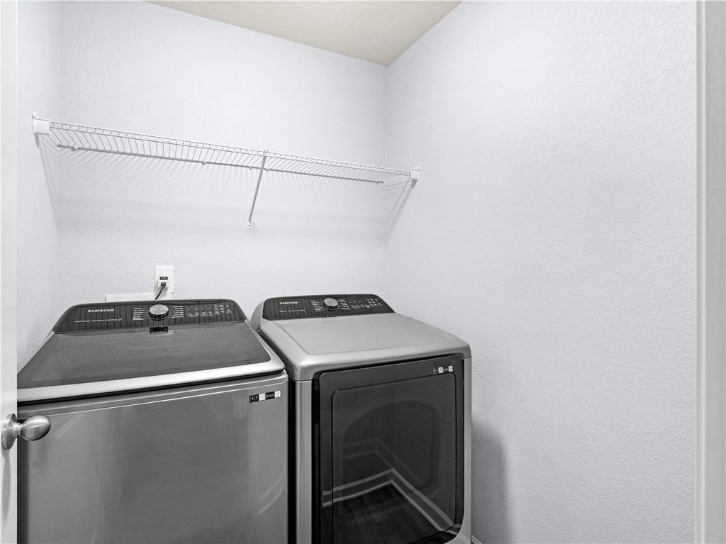 10891 Wheeler Trace Hampton, GA 30228 - Photo 31 of 45 a utility room with dryer and washer