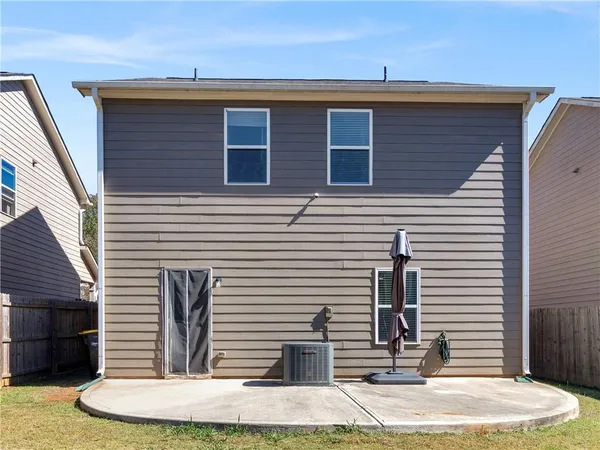 a view of living room with furniture and a couch