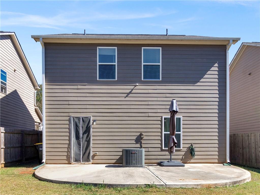 10891 Wheeler Trace Hampton, GA 30228 - Photo 41 of 45 a front view of a house with entertaining space