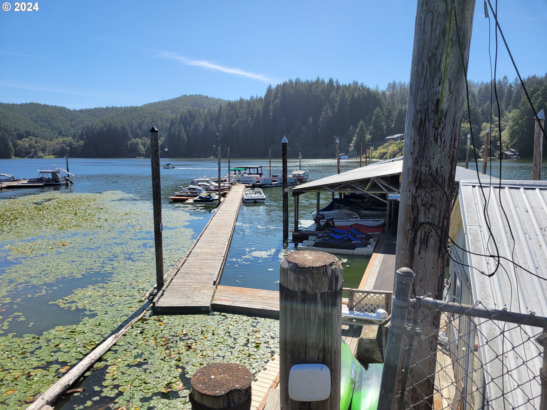 813 Jacobson Way Lakeside, OR 97449 - Photo 4 of 5 a view of a porch with furniture and a yard