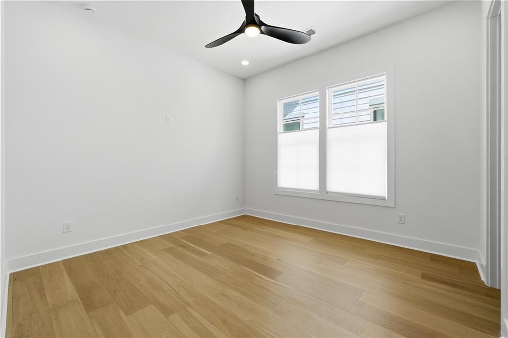 237 Lask Lane Milton, GA 30004 - Photo 53 of 63 an empty room with a window and ceiling fan
