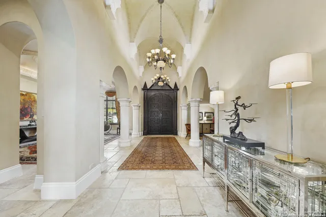 a view of living room with a chandelier