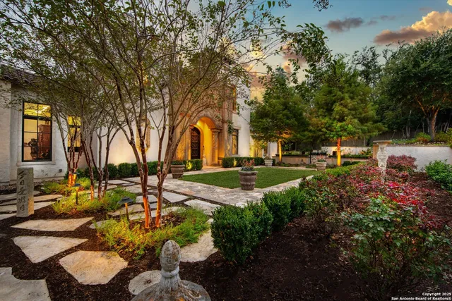 a view of yard with swimming pool and furniture