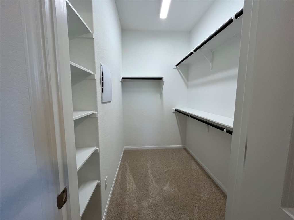 8506 Wellspring Loop Round Rock, TX 78665 - Photo 12 of 33 Master walk in closet
