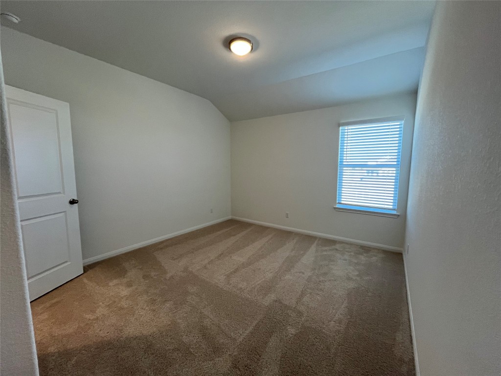 8506 Wellspring Loop Round Rock, TX 78665 - Photo 20 of 33 Upstairs bedroom