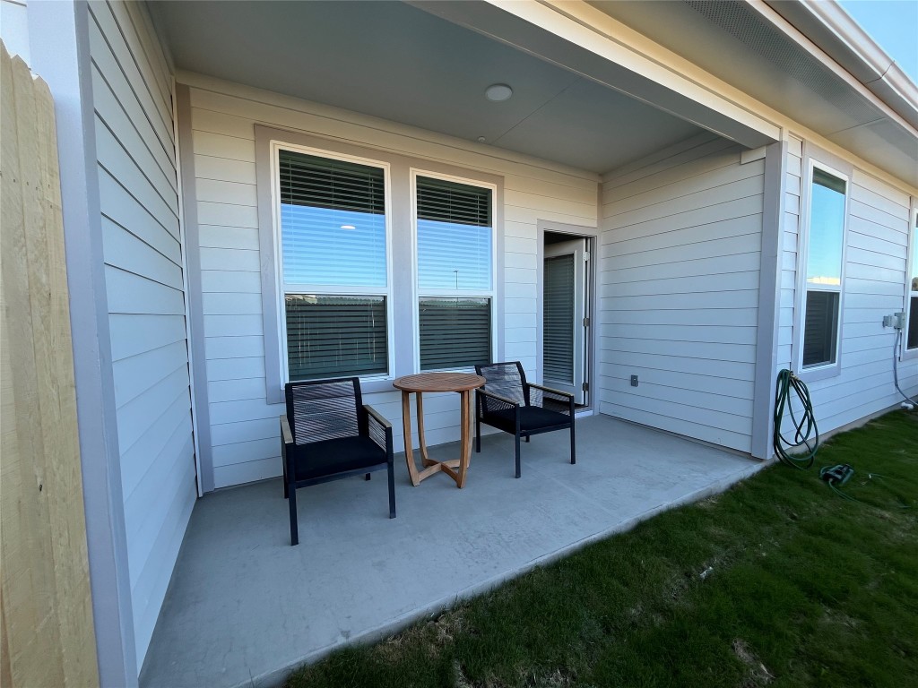 8506 Wellspring Loop Round Rock, TX 78665 - Photo 23 of 33 Back covered patio with private fenced in back yard.