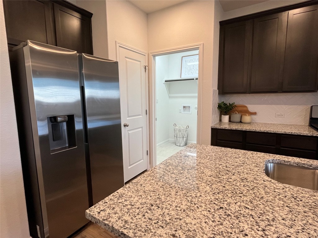 8506 Wellspring Loop Round Rock, TX 78665 - Photo 3 of 33 Home includes refrigerator