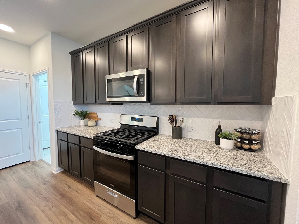 8506 Wellspring Loop Round Rock, TX 78665 - Photo 4 of 33 42" cabinets with tons of storage space
