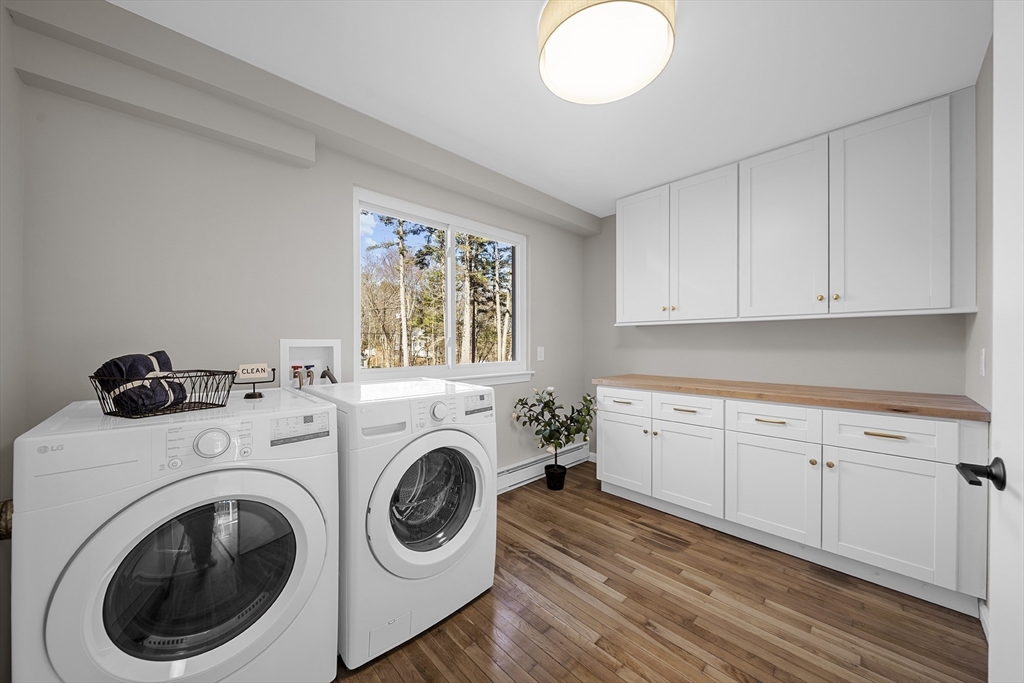 4 Fox Run Road Bedford, MA 01730 - Photo 19 of 42 a utility room with sink dryer and washer