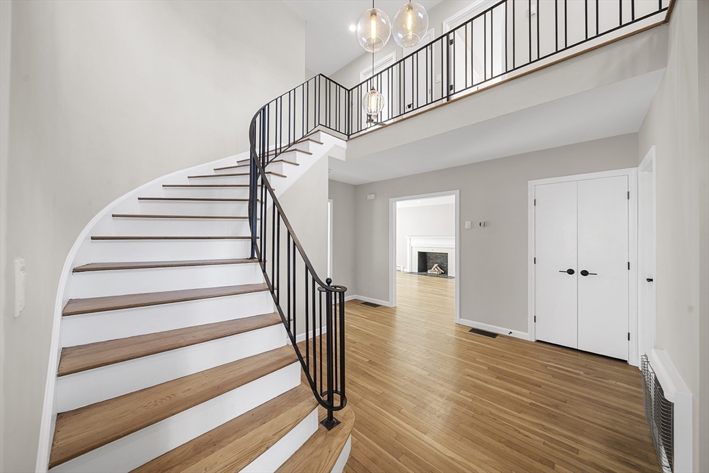 4 Fox Run Road Bedford, MA 01730 - Photo 3 of 42 a view of entryway with wooden floor