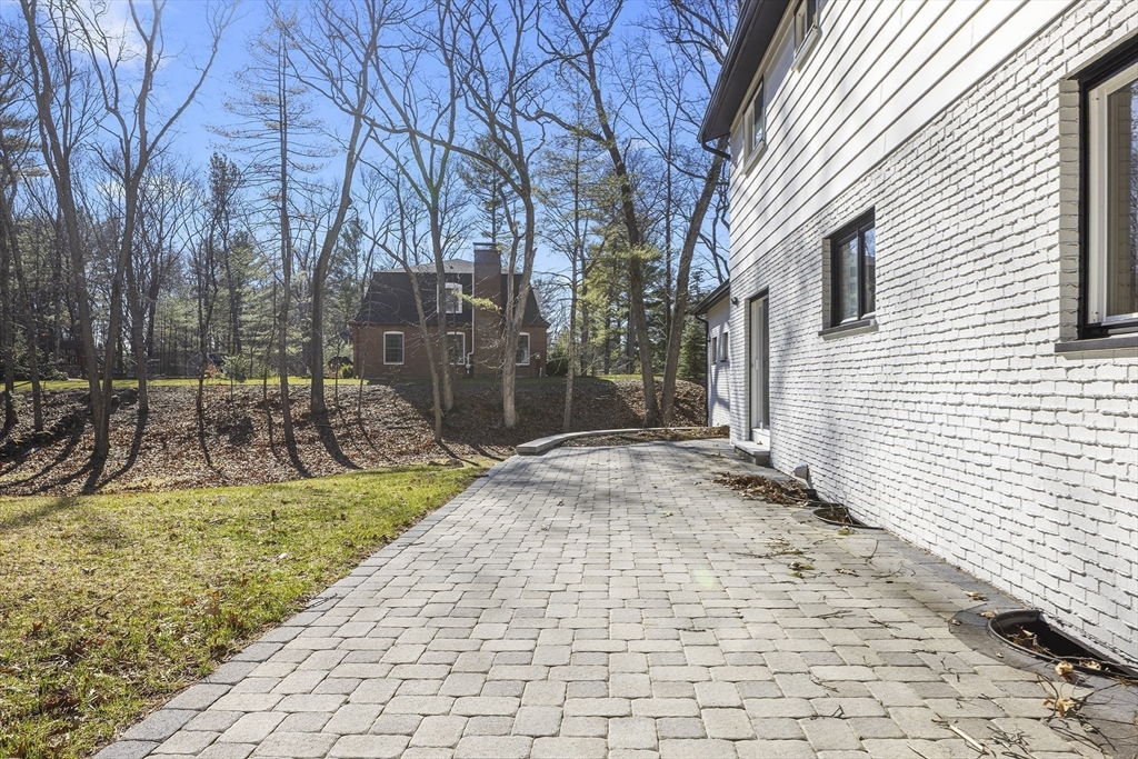 4 Fox Run Road Bedford, MA 01730 - Photo 39 of 42 a view of a backyard of the house