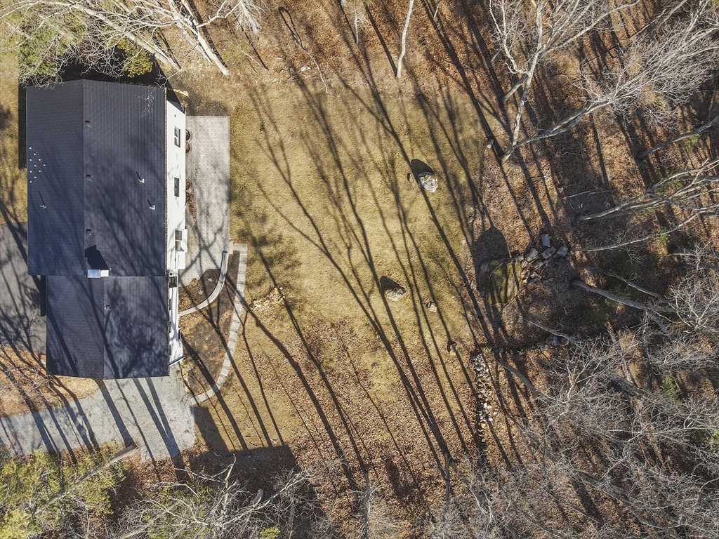 4 Fox Run Road Bedford, MA 01730 - Photo 42 of 42 a backyard of a house