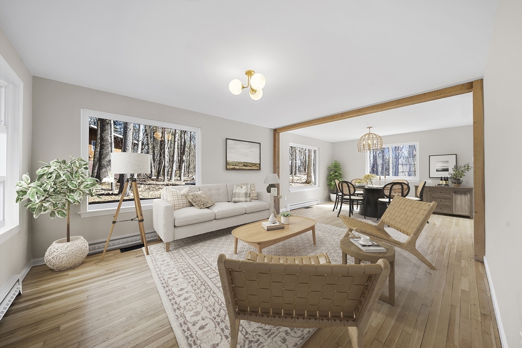 4 Fox Run Road Bedford, MA 01730 - Photo 6 of 42 a living room with furniture dining area and a chandelier