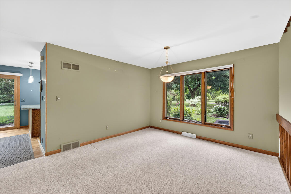 6028 Quaker Hill Road Mount Pleasant, WI 53406 - Photo 9 of 50 Spacious formal dining space.