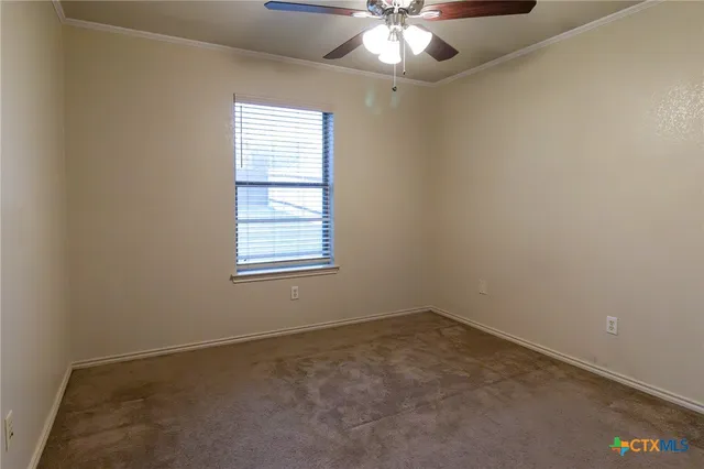 an empty room with an entrance to other room