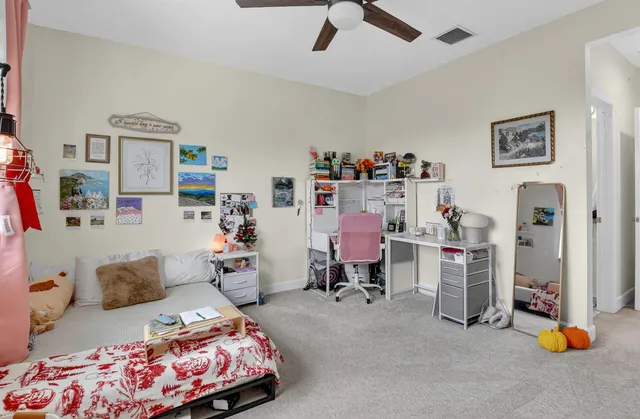 a view of house with swimming pool outdoor seating
