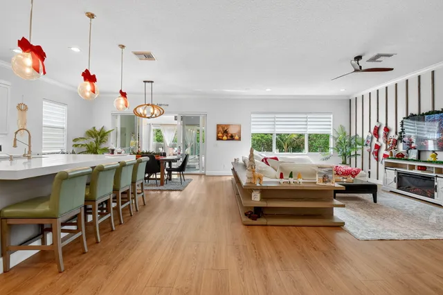 a living room with furniture fireplace and window