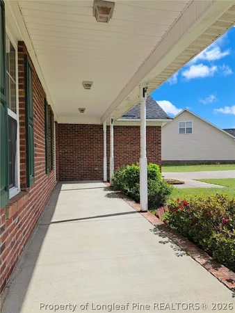 a view of a backyard of the house