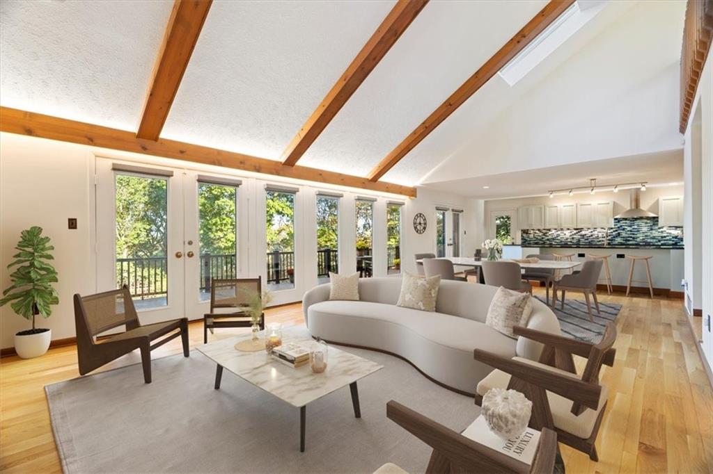 3 Partridge Court Sewickley, PA 15143 - Photo 13 of 50 a living room with furniture and a large window