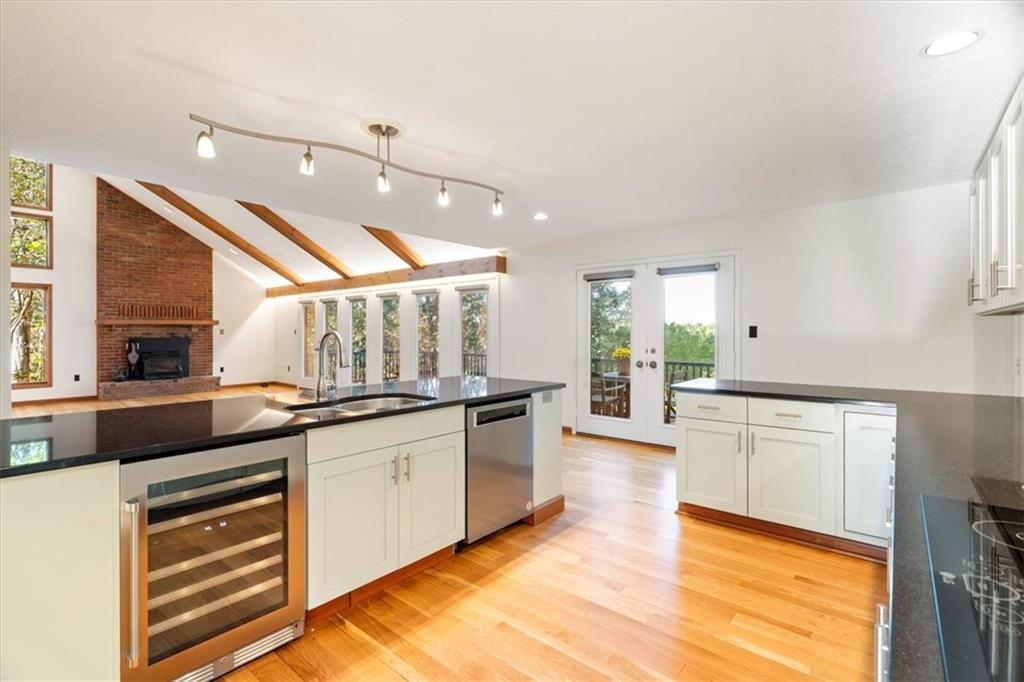 3 Partridge Court Sewickley, PA 15143 - Photo 15 of 50 a kitchen with stainless steel appliances granite countertop a stove a sink and a refrigerator