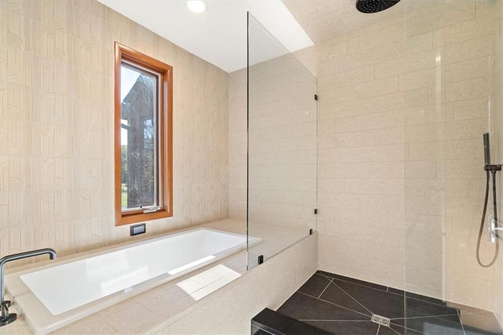 3 Partridge Court Sewickley, PA 15143 - Photo 25 of 50 a bathroom with a tub and shower