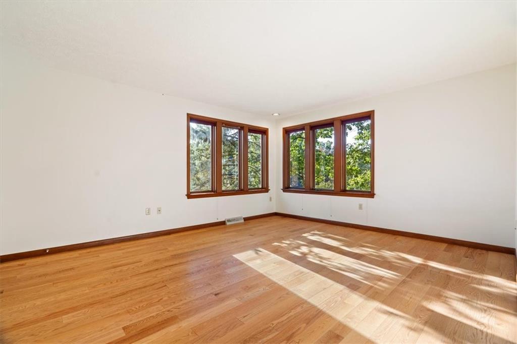 3 Partridge Court Sewickley, PA 15143 - Photo 33 of 50 an empty room with wooden floor and windows