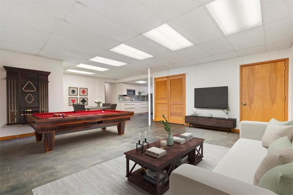 3 Partridge Court Sewickley, PA 15143 - Photo 35 of 50 a living room with furniture and a flat screen tv