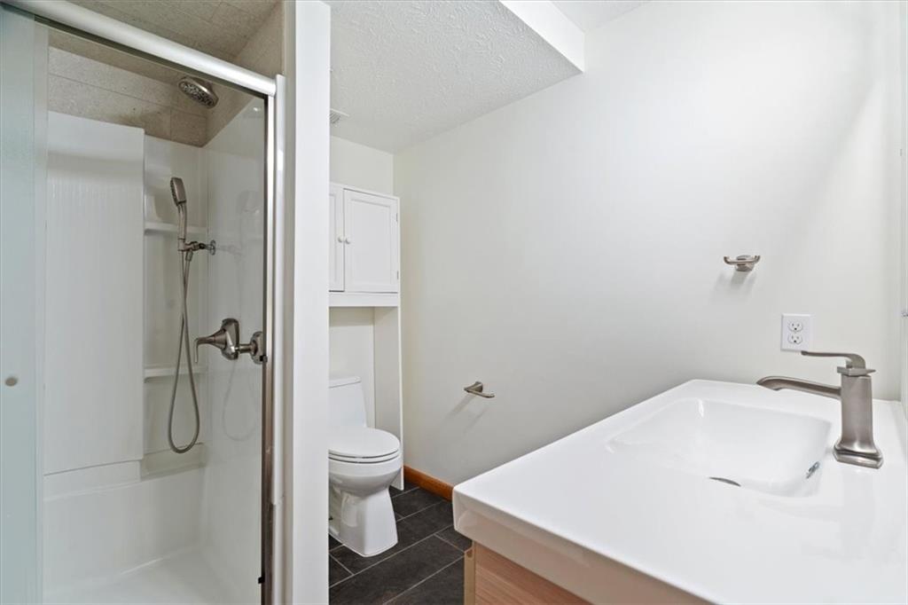 3 Partridge Court Sewickley, PA 15143 - Photo 38 of 50 a bathroom with a sink and toilet