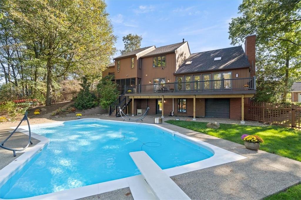 3 Partridge Court Sewickley, PA 15143 - Photo 42 of 50 a view of a big house with a small yard and large trees