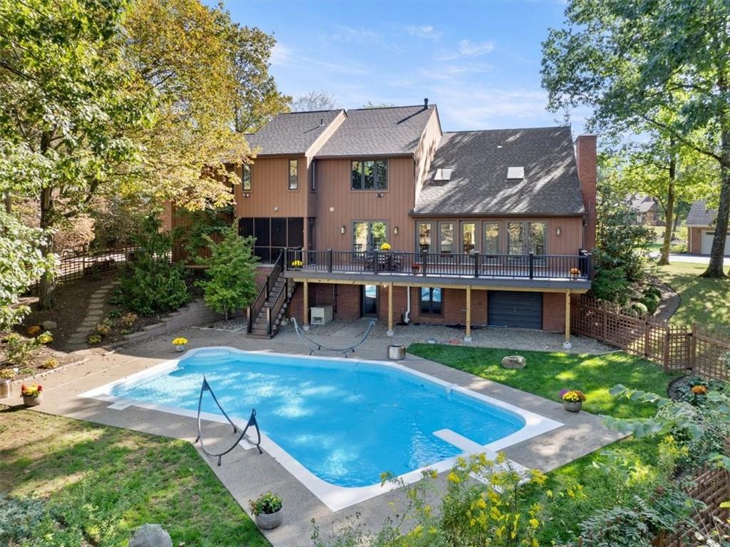 3 Partridge Court Sewickley, PA 15143 - Photo 43 of 50 an aerial view of a house with swimming pool garden and patio