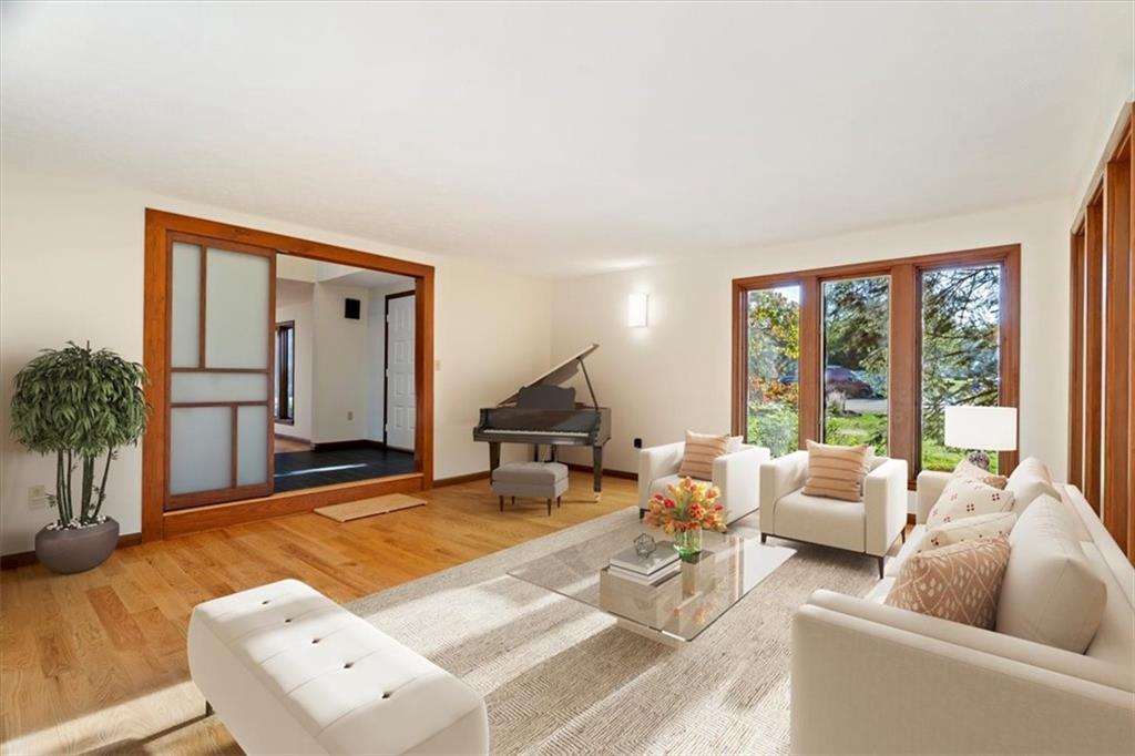 3 Partridge Court Sewickley, PA 15143 - Photo 7 of 50 a living room with furniture and a large window