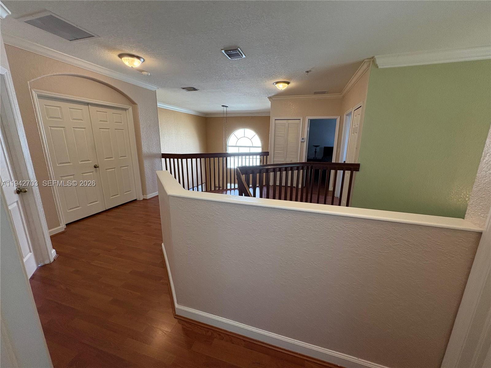 5902 Southwest 166th Court Miami, FL 33193 - Photo 12 of 27 a view of entryway with stairs