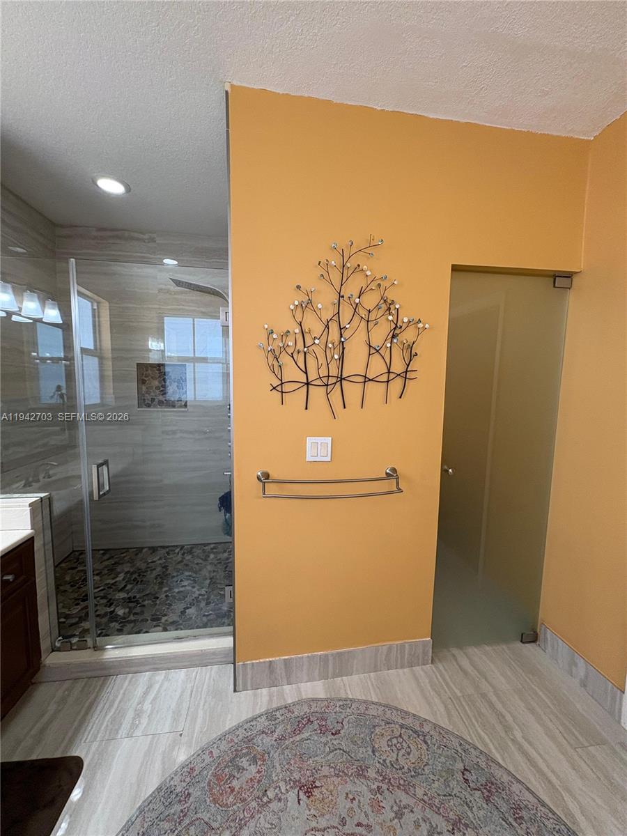 5902 Southwest 166th Court Miami, FL 33193 - Photo 15 of 27 a view of a hallway with wooden floor