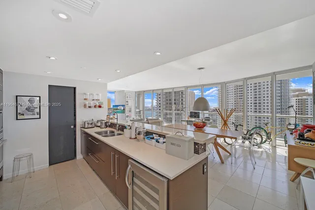 a kitchen with an oven a stove and cabinets
