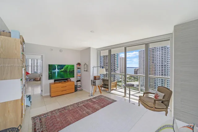 a bathroom with a sink a tub and a mirror