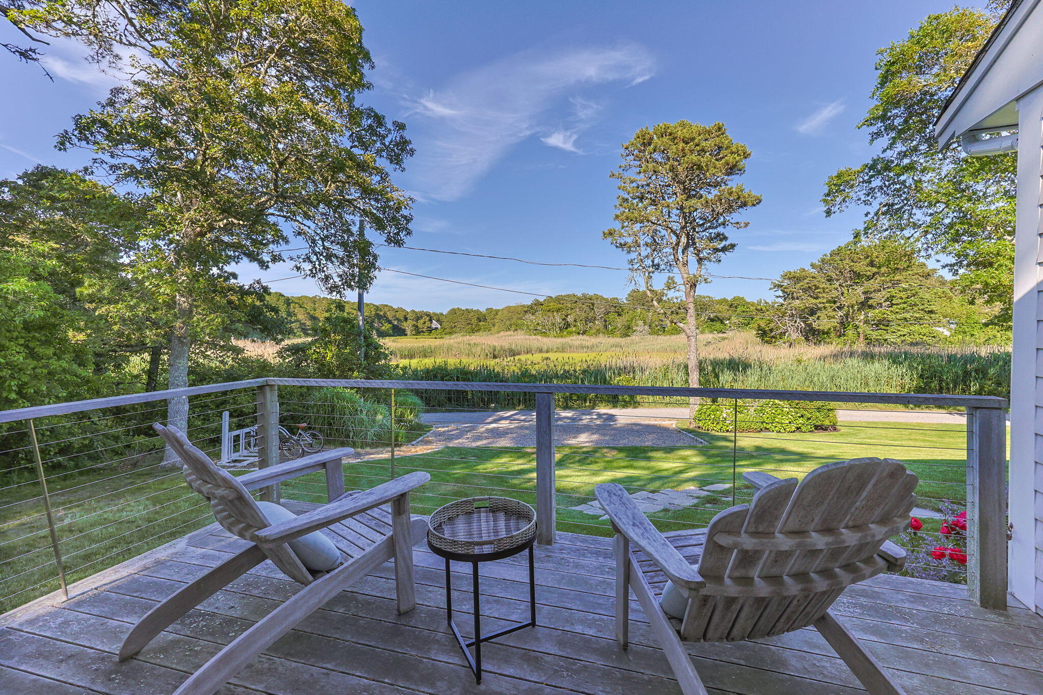 17 Bog Way Road Chatham, MA 02633 - Photo 13 of 39 a view of a swimming pool with a patio and a garden