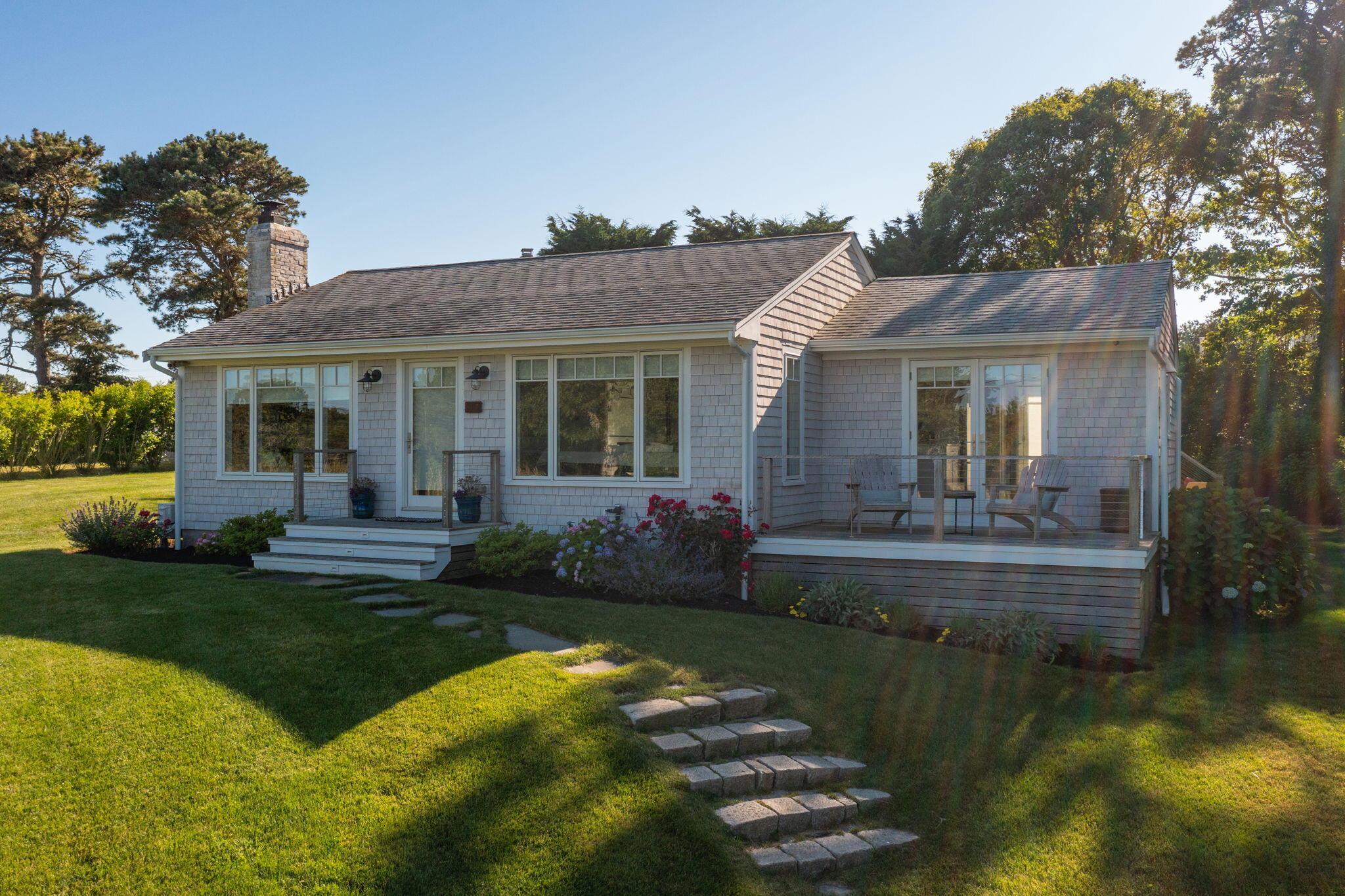 17 Bog Way Road Chatham, MA 02633 - Photo 3 of 39 a view of a house with backyard and porch