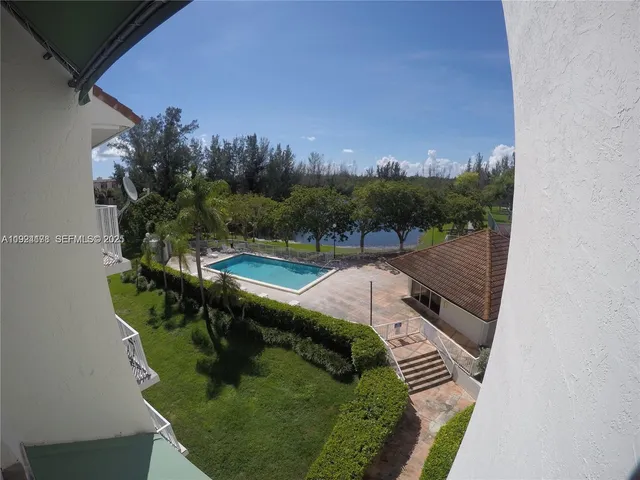 a view of a lake from a balcony
