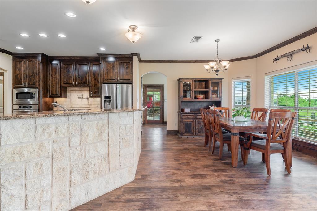 289 Blackjack Road Valley View, TX 76272 - Photo 23 of 40 a view of a kitchen and dining room