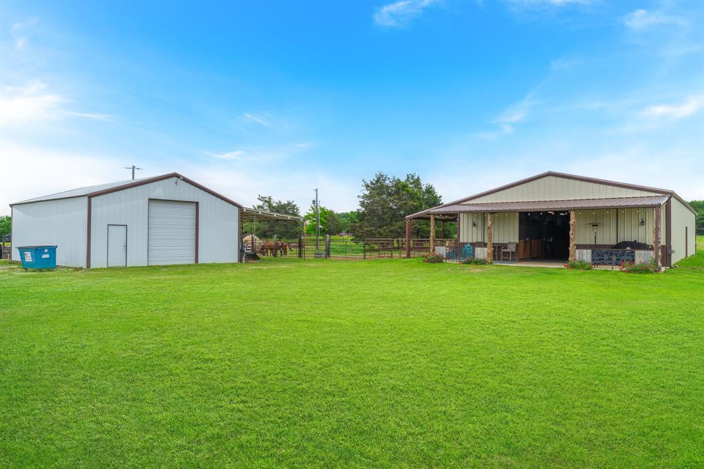 289 Blackjack Road Valley View, TX 76272 - Photo 33 of 40 a front view of house with yard and green space