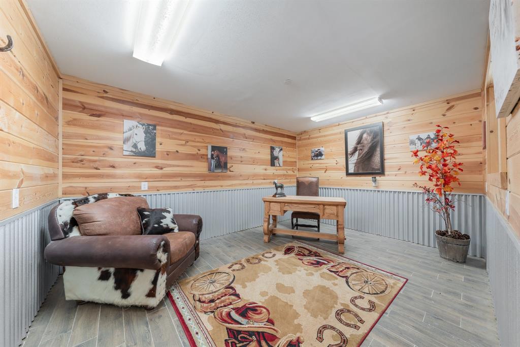 289 Blackjack Road Valley View, TX 76272 - Photo 36 of 40 a living room with furniture and a wooden floor